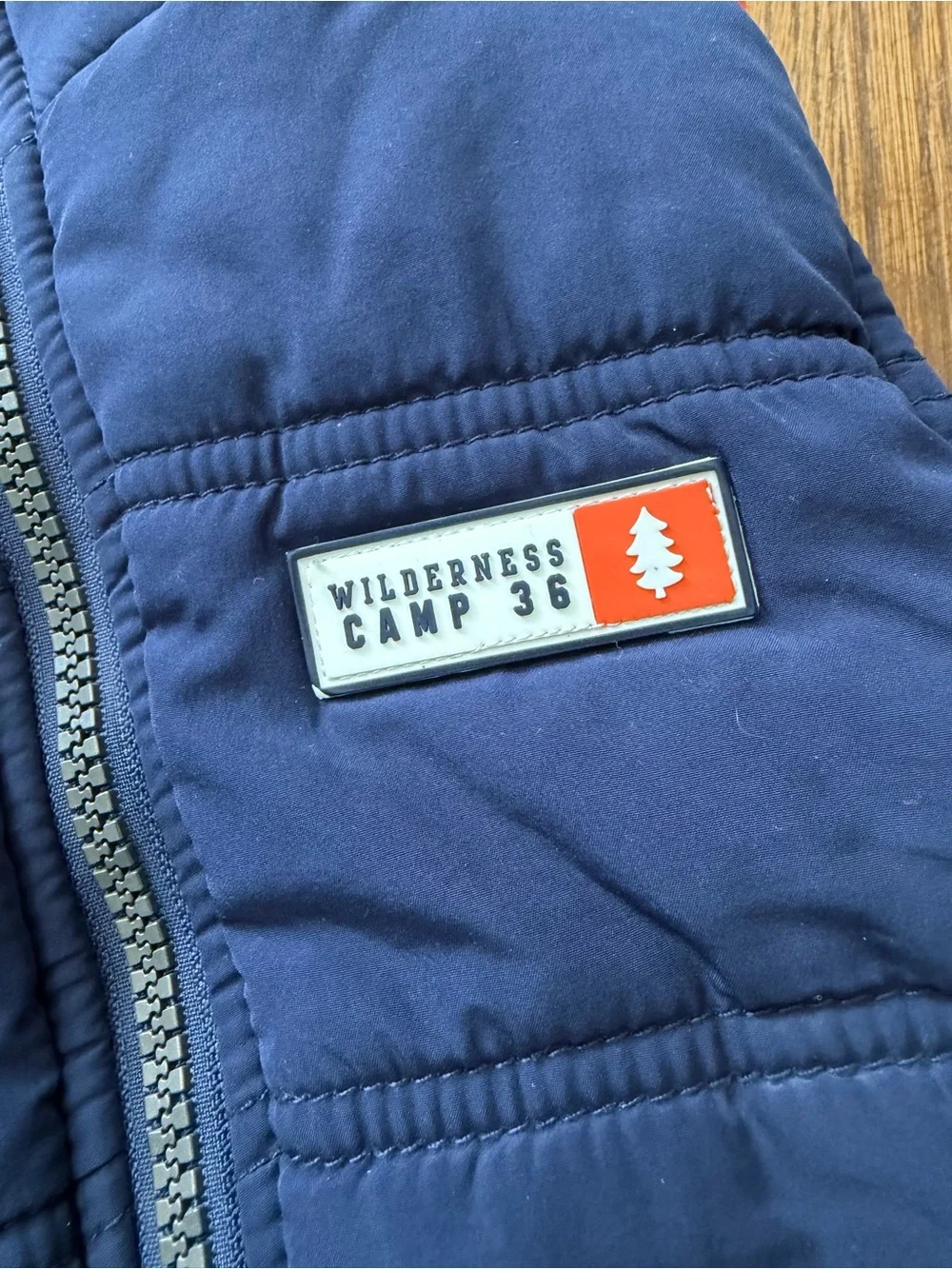 Carter’s Navy Blue Puffer Vest with Orange Fleece Lining, size 2T